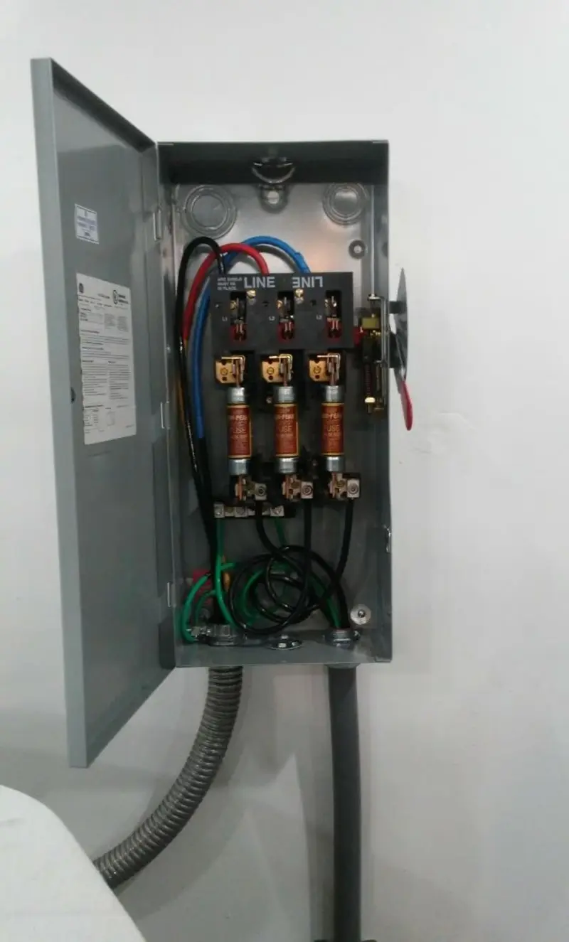 Three-phase disconnect switch installed for Smoke Detector Installation in Vero Beach